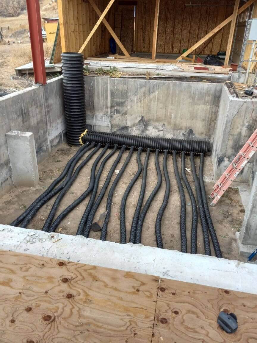 6' deep climate battery air tubes circulating warm air to sustain a stable growing environment