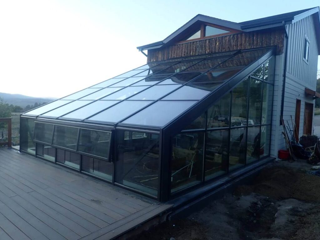 passive solar greenhouse, passive solar geothermal, greenhouse heat battery, greenhouse, passive solar greenhouse glazing angle, what is a passive solar greenhouse, greenhouse passive heating